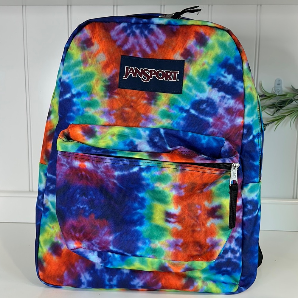 Jansport tie die back pack.